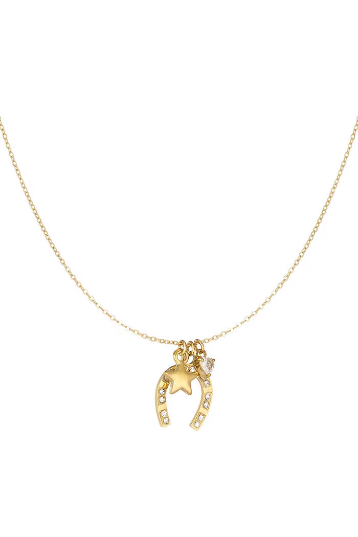 Una herradura con brillantes, una estrella y un corazón, representando suerte, esperanza y amor.