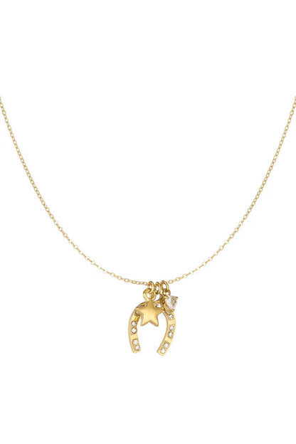 Una herradura con brillantes, una estrella y un corazón, representando suerte, esperanza y amor.